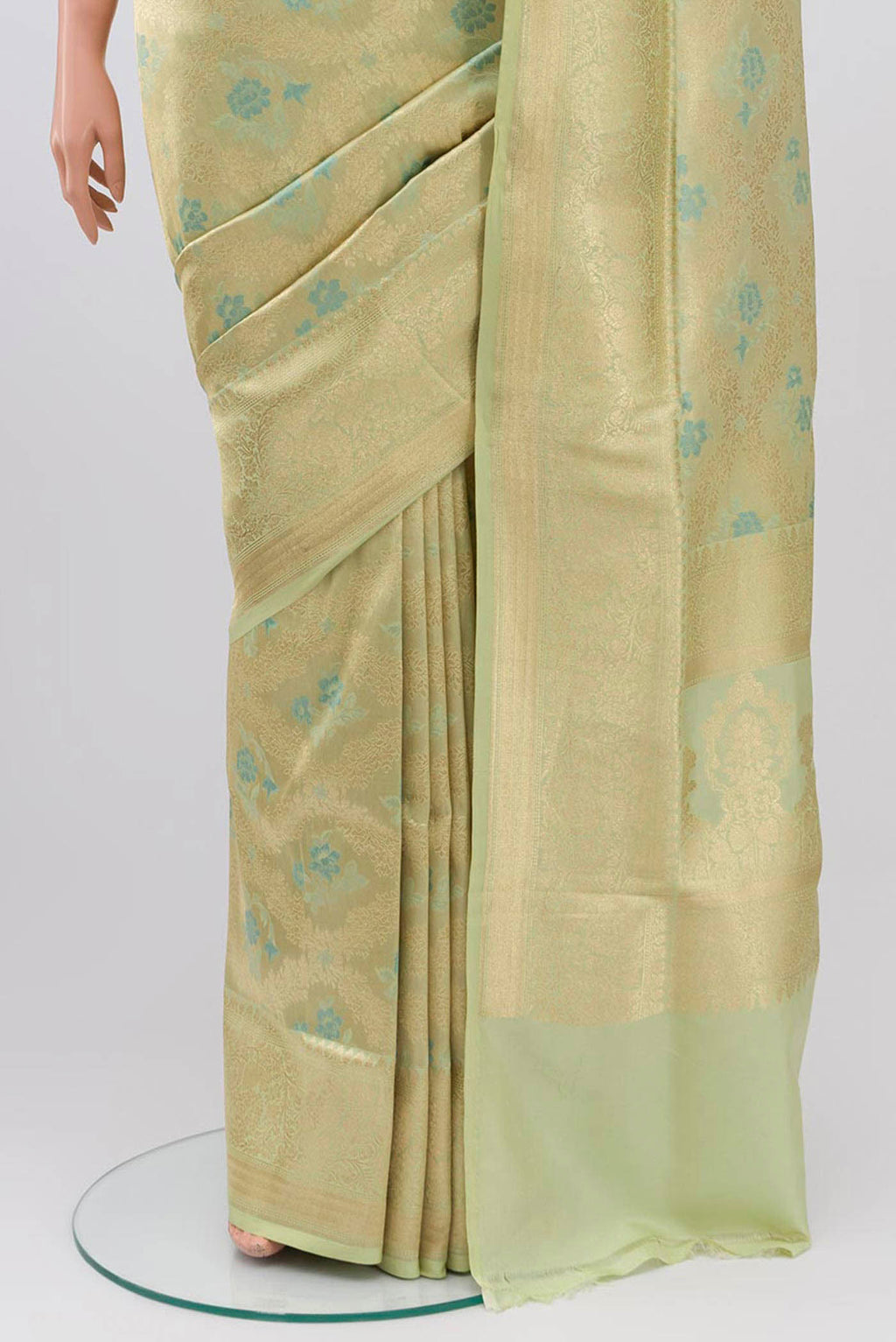 Pleats and pallu of Beige Banarasi Silk Saree with Zari And Thread Butta on the body and Zari Border