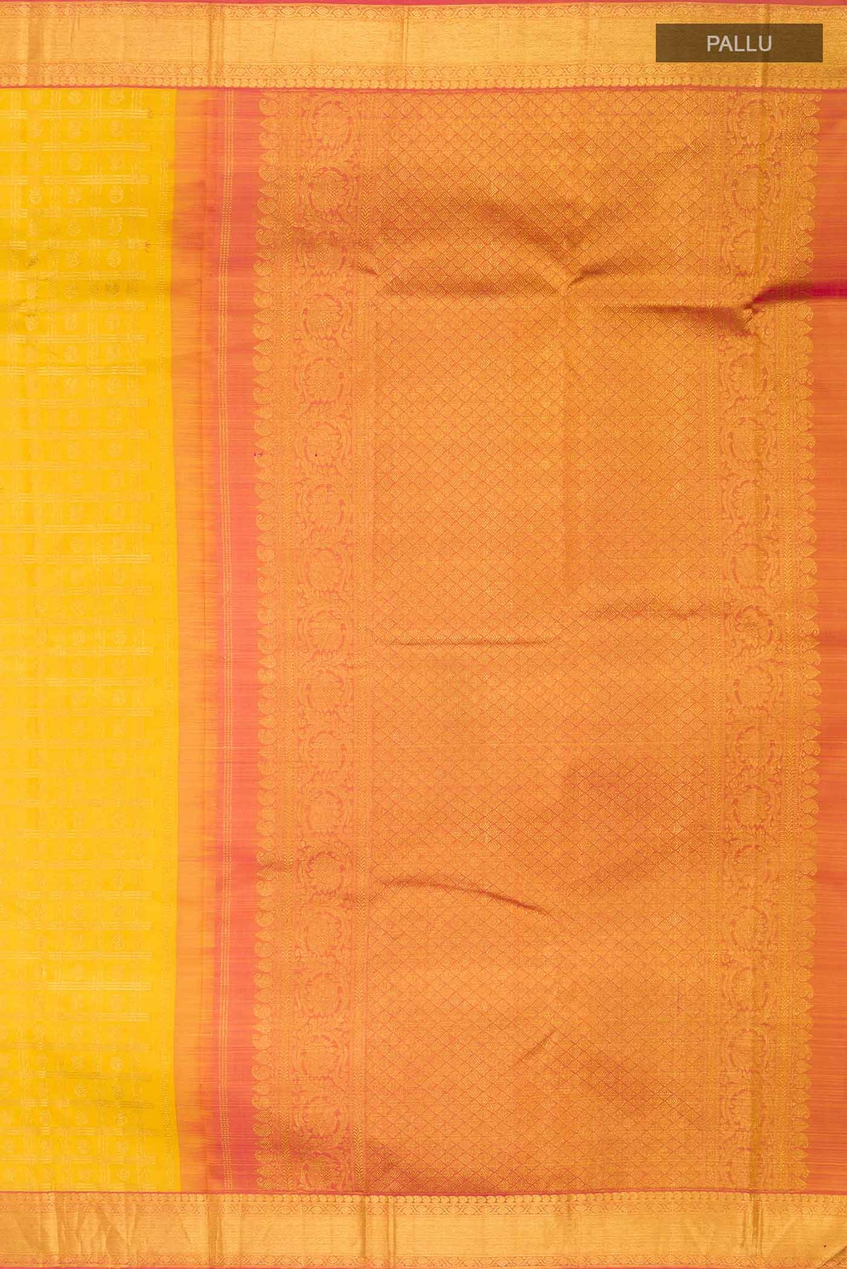 Close up image of the pallu of Yellow Kanchipuram Silk Saree with Zari Brocade on the body and Zari Border