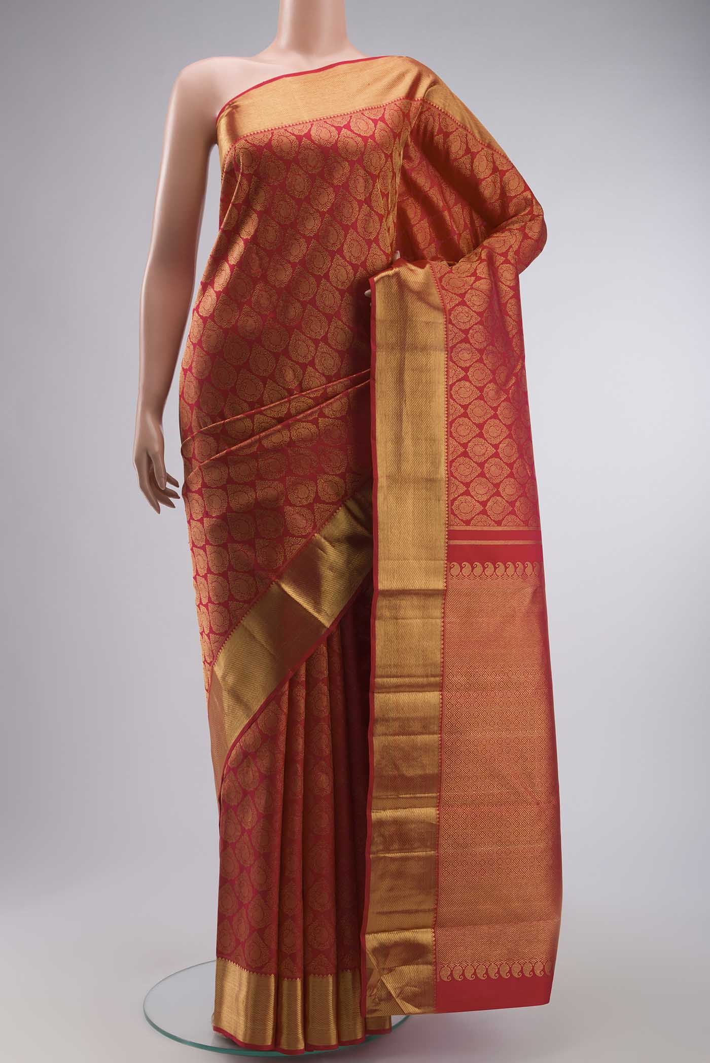 Pure Silk Pure Zari Red with Pink Color Kanchipuram Saree with Zari Brocade on the body and Zari Border displayed on a mannequin