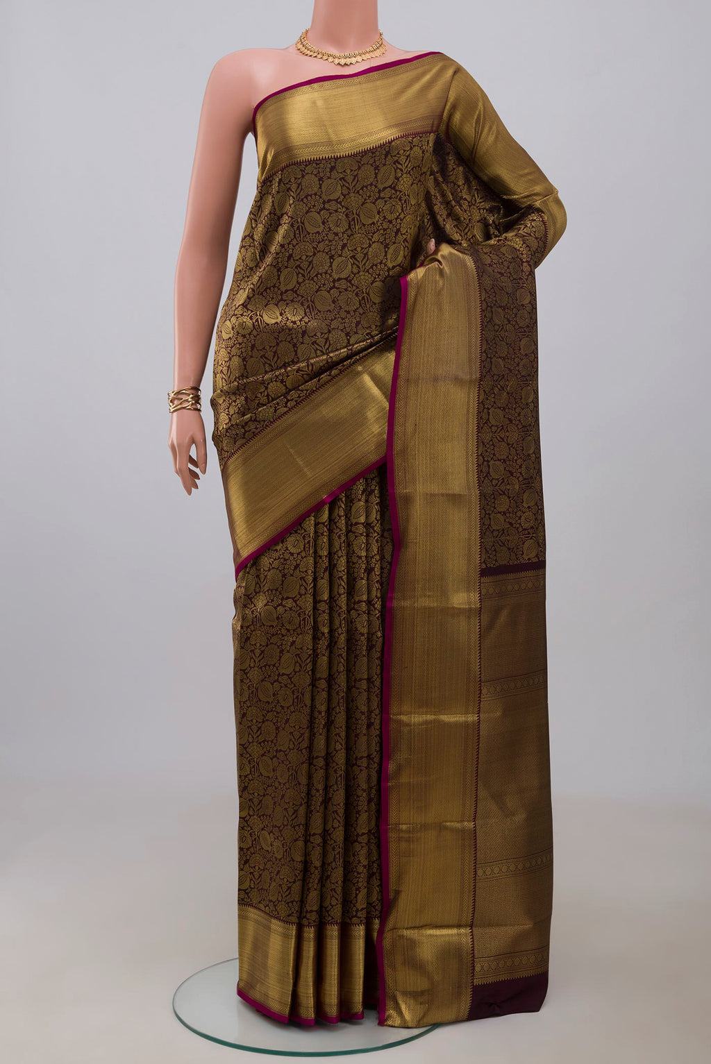 Pure Silk Pure Zari Coffee Brown Kanjivaram Saree with Zari Brocade on the body and Zari Border.  displayed on a mannequin