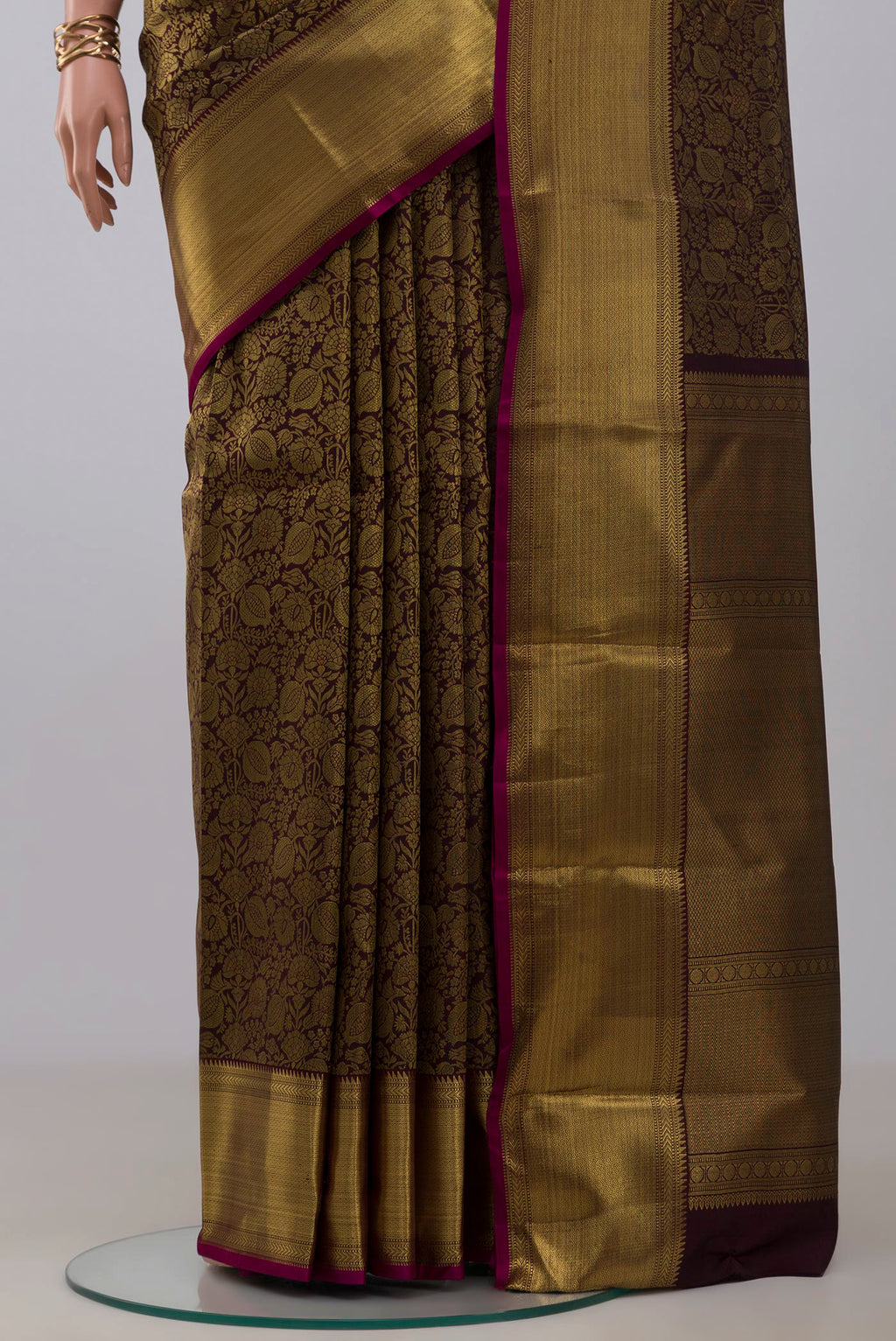 Pleats and pallu of Pure Silk Pure Zari Coffee Brown Kanjivaram Saree with Zari Brocade on the body and Zari Border. 