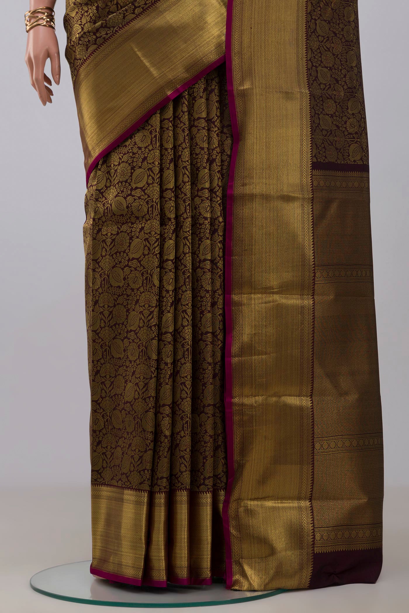 Pleats and pallu of Pure Silk Pure Zari Coffee Brown Kanjivaram Saree with Zari Brocade on the body and Zari Border. 