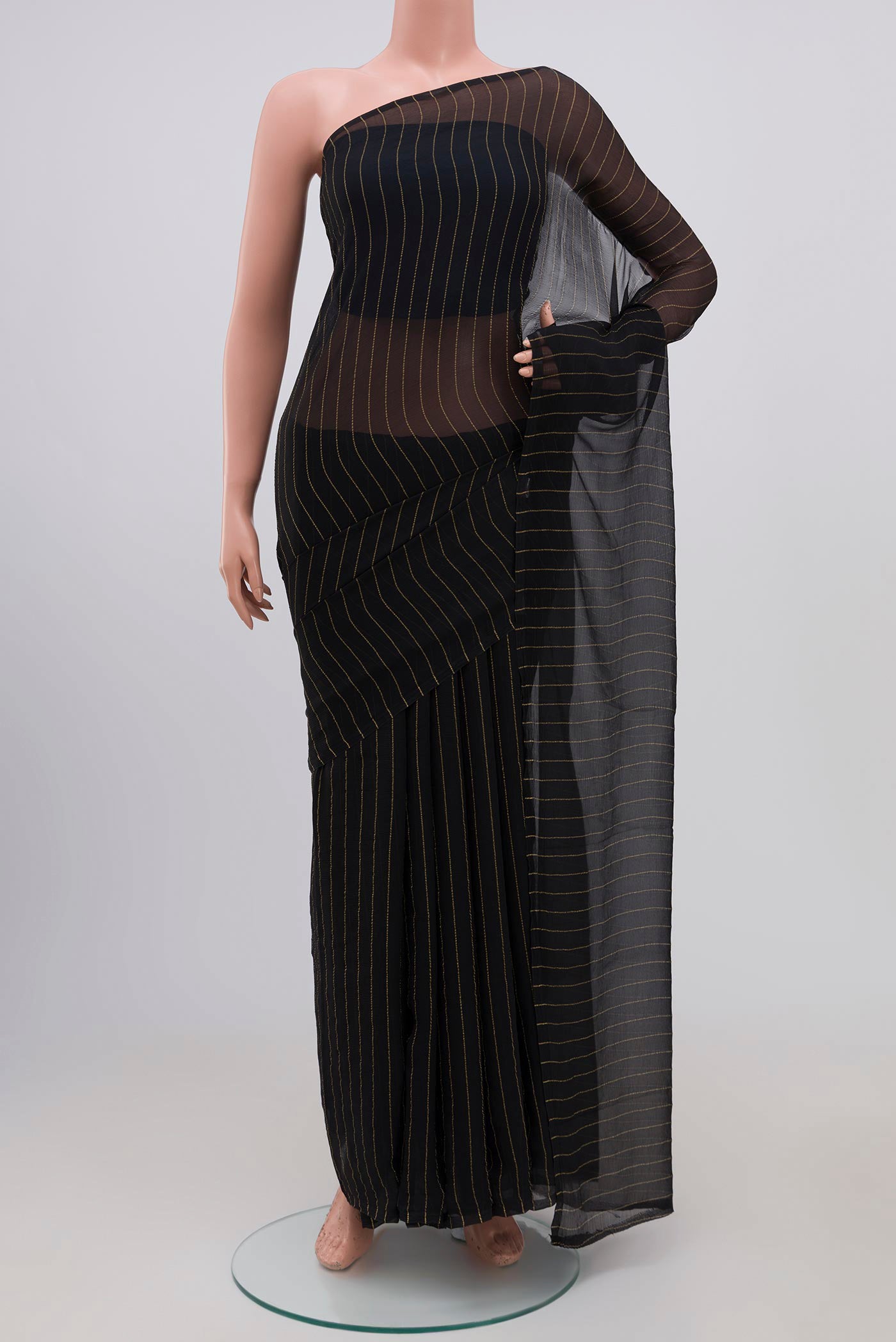 Black Chiffon Saree with Zari Butta on the body and Without Border.  displayed on a mannequin