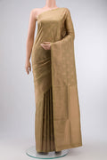 Beige Soft Silk Saree with Zari Butta on the body and Zari Border displayed on a mannequin