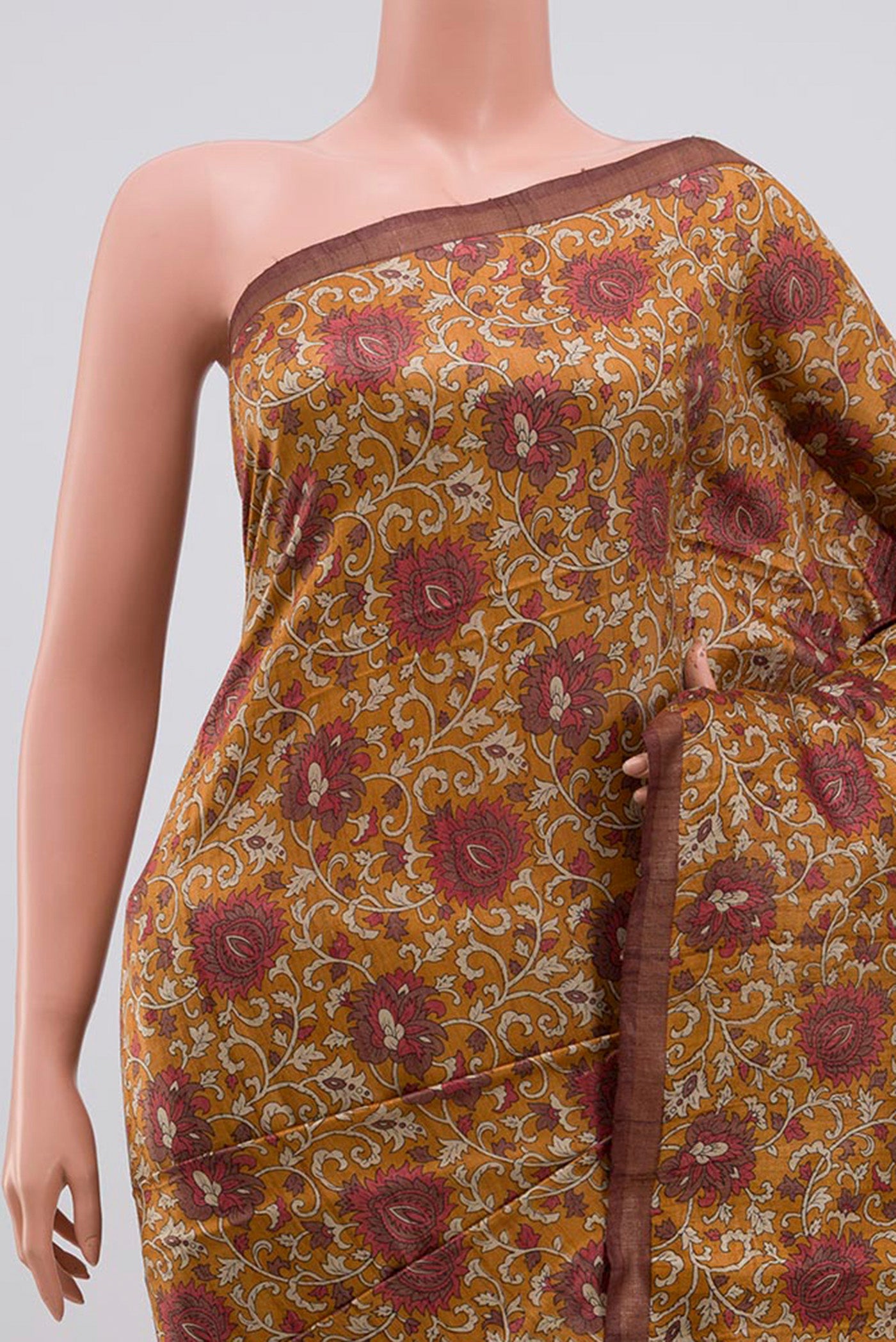 Border image of Brown Tussar Silk Saree with Printed design on the body and Thin Zari Line. 