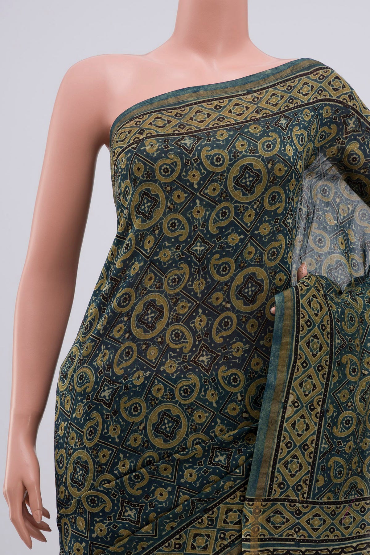 Border image of Light Blue Chanderi Silk Cotton Saree with Ajrakh Print on the body and Thin Zari Line. 