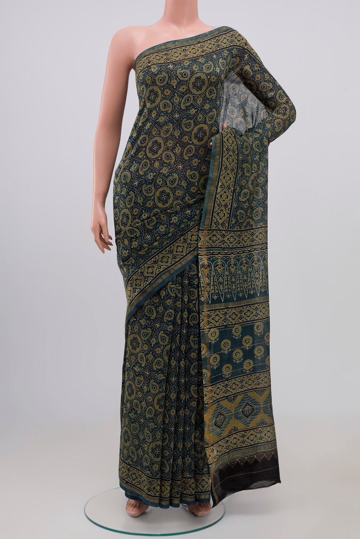 Light Blue Chanderi Silk Cotton Saree with Ajrakh Print on the body and Thin Zari Line.  displayed on a mannequin