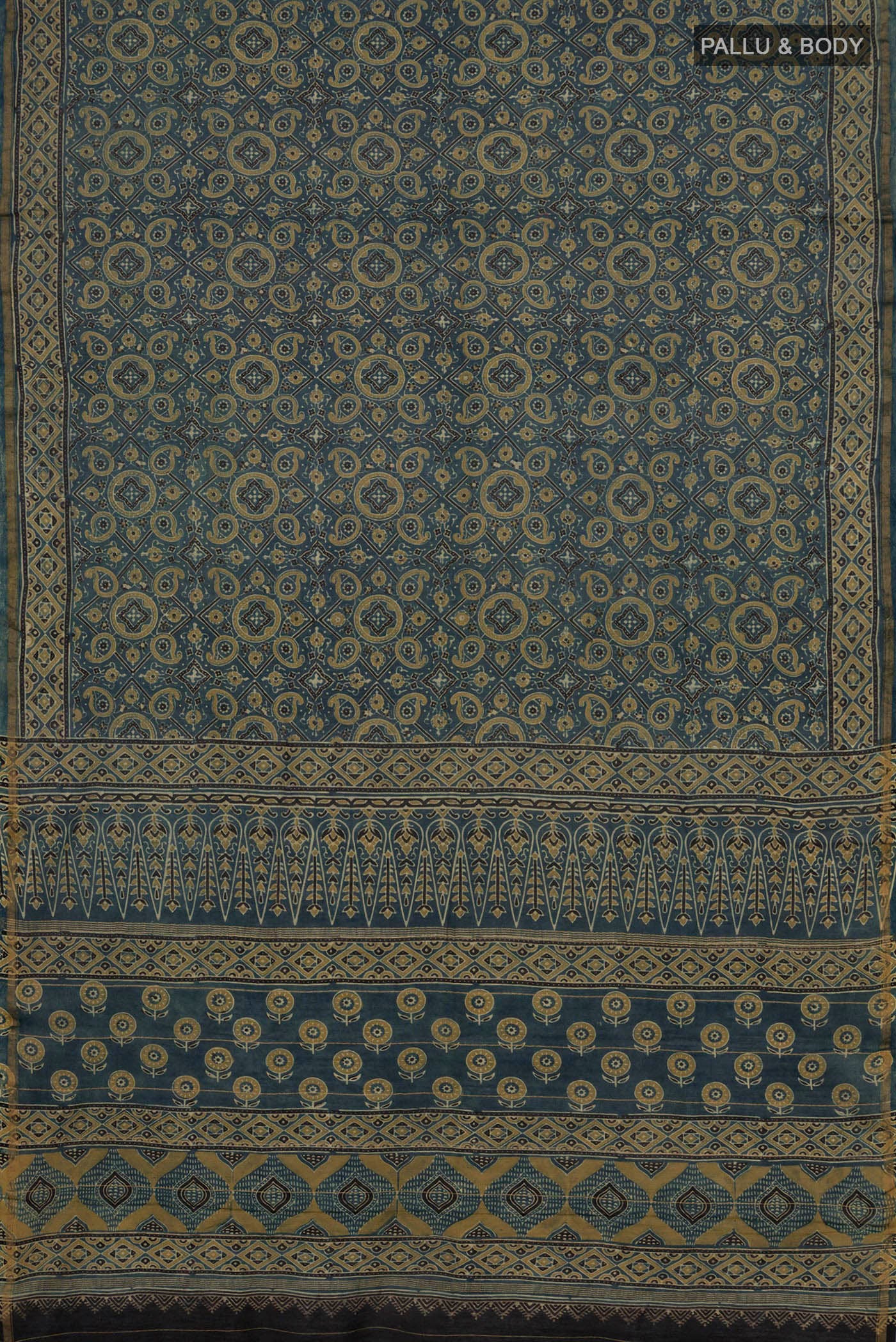 Flat view of Light Blue Chanderi Silk Cotton Saree with Ajrakh Print on the body and Thin Zari Line. 