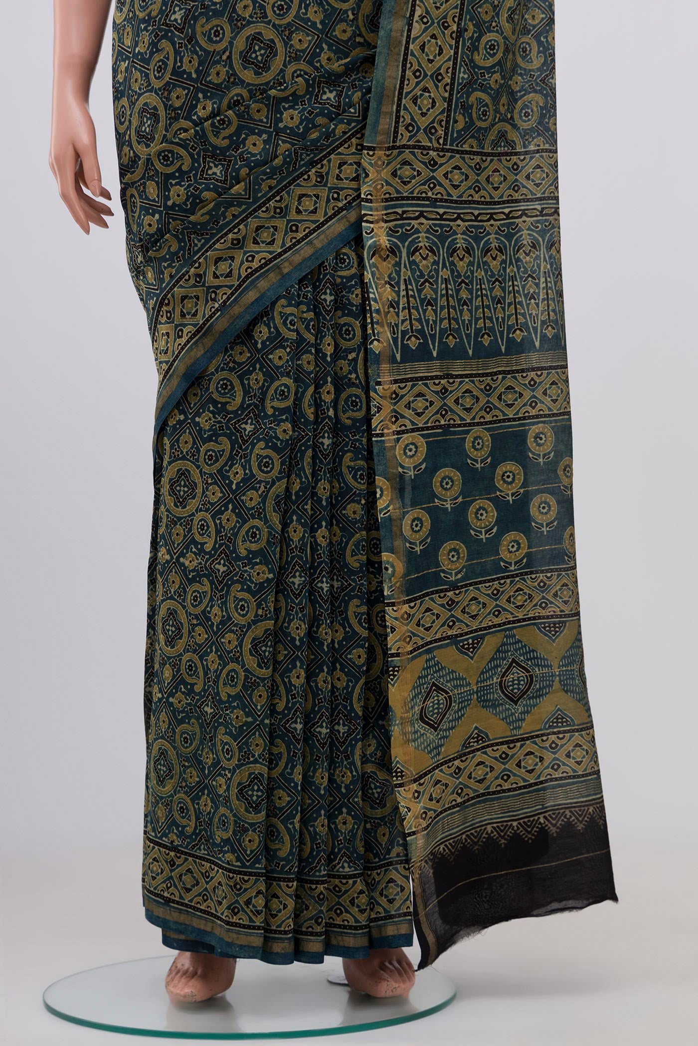 Pleats and pallu of Light Blue Chanderi Silk Cotton Saree with Ajrakh Print on the body and Thin Zari Line. 