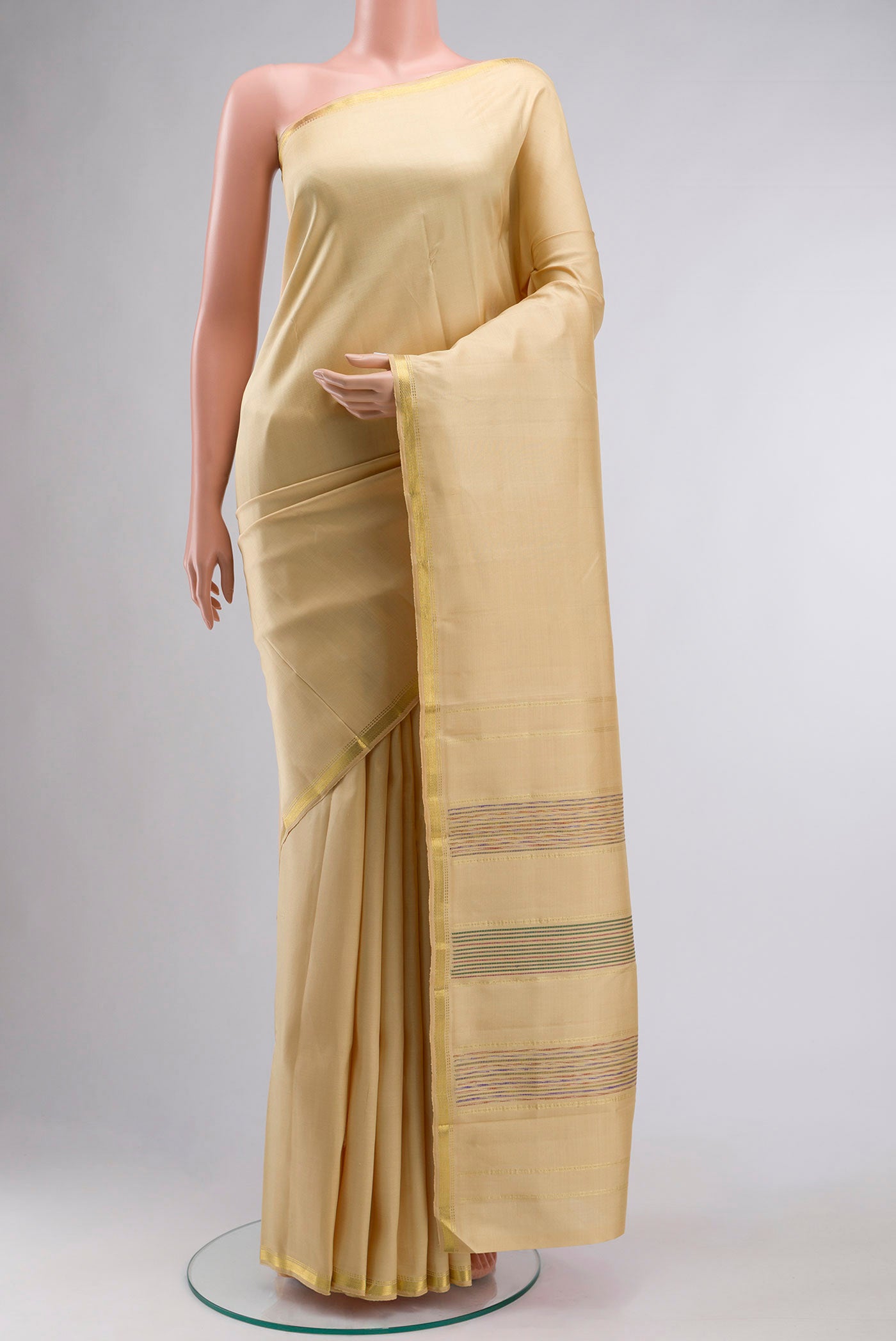 Sandal Kanchipuram Silk Saree with Plain Body and Zari Border displayed on a mannequin