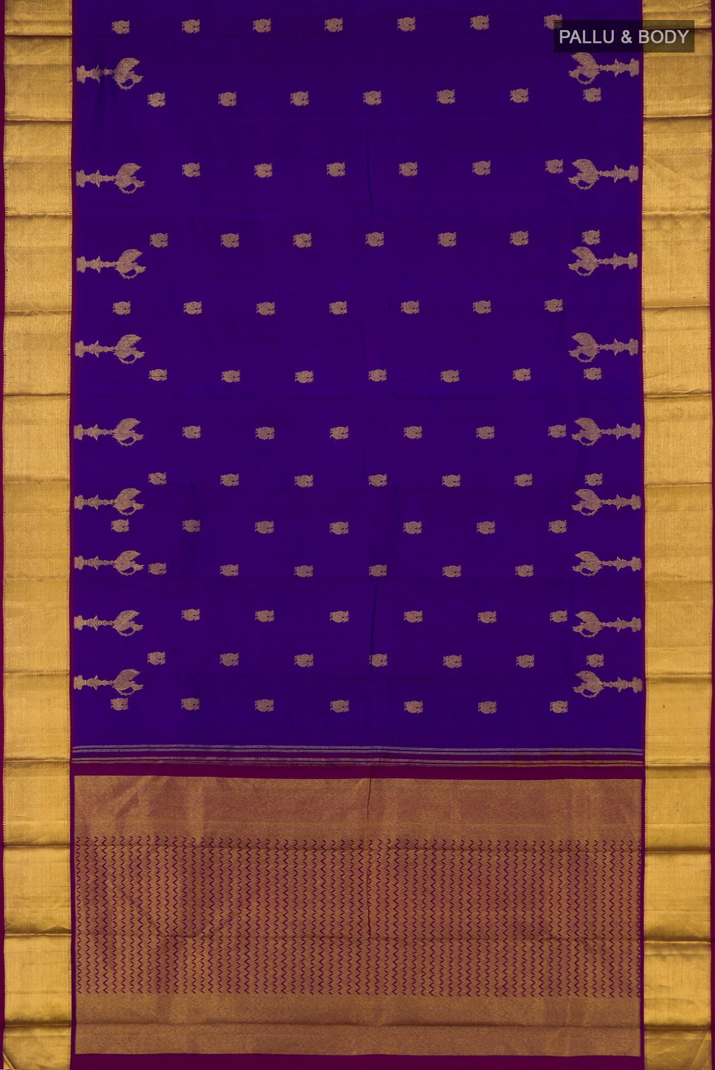 Flat view of Blue Dual Tone Kanjivaram Silk Saree with Zari Butta on the body and Zari Border. 