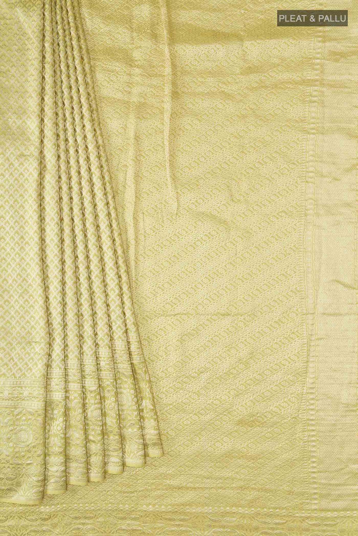 Pleats and pallu of Yellow Mysore Crepe Saree with Zari Brocade on the body and Zari Border