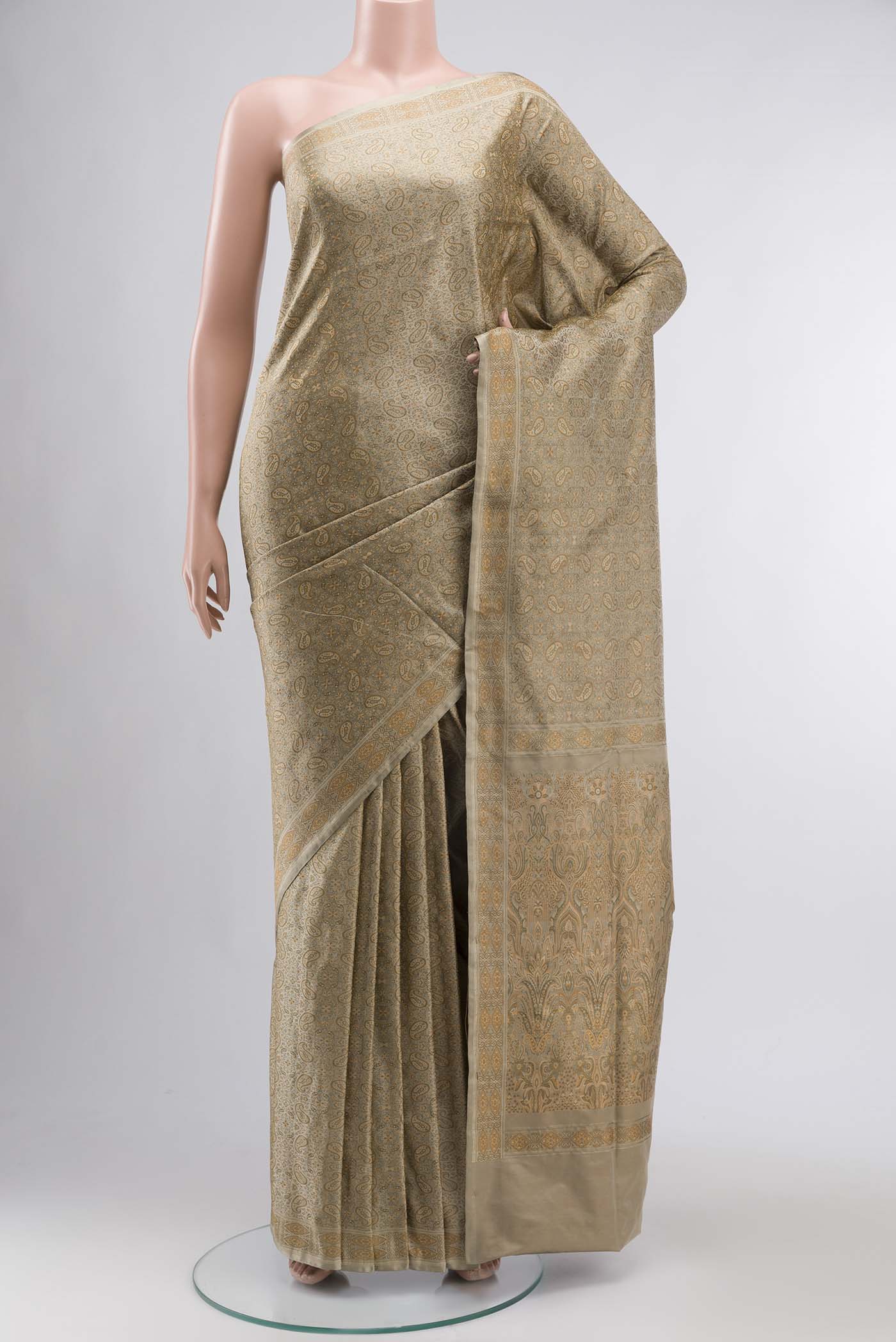 Beige Banarasi Tanchoi Silk Saree with Jacquard design on the body and Thread Border displayed on a mannequin