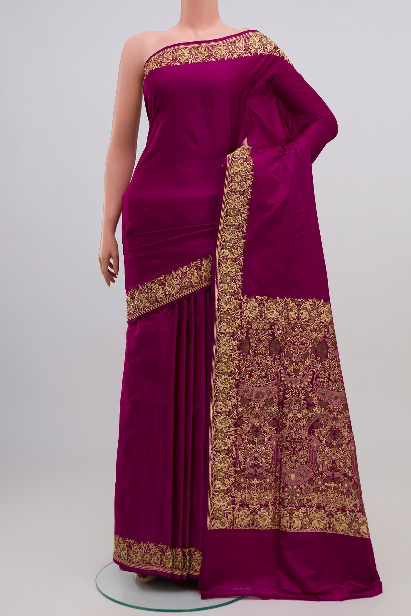 Purple Banarasi Silk Saree with Plain Body and Thread Border.  displayed on a mannequin