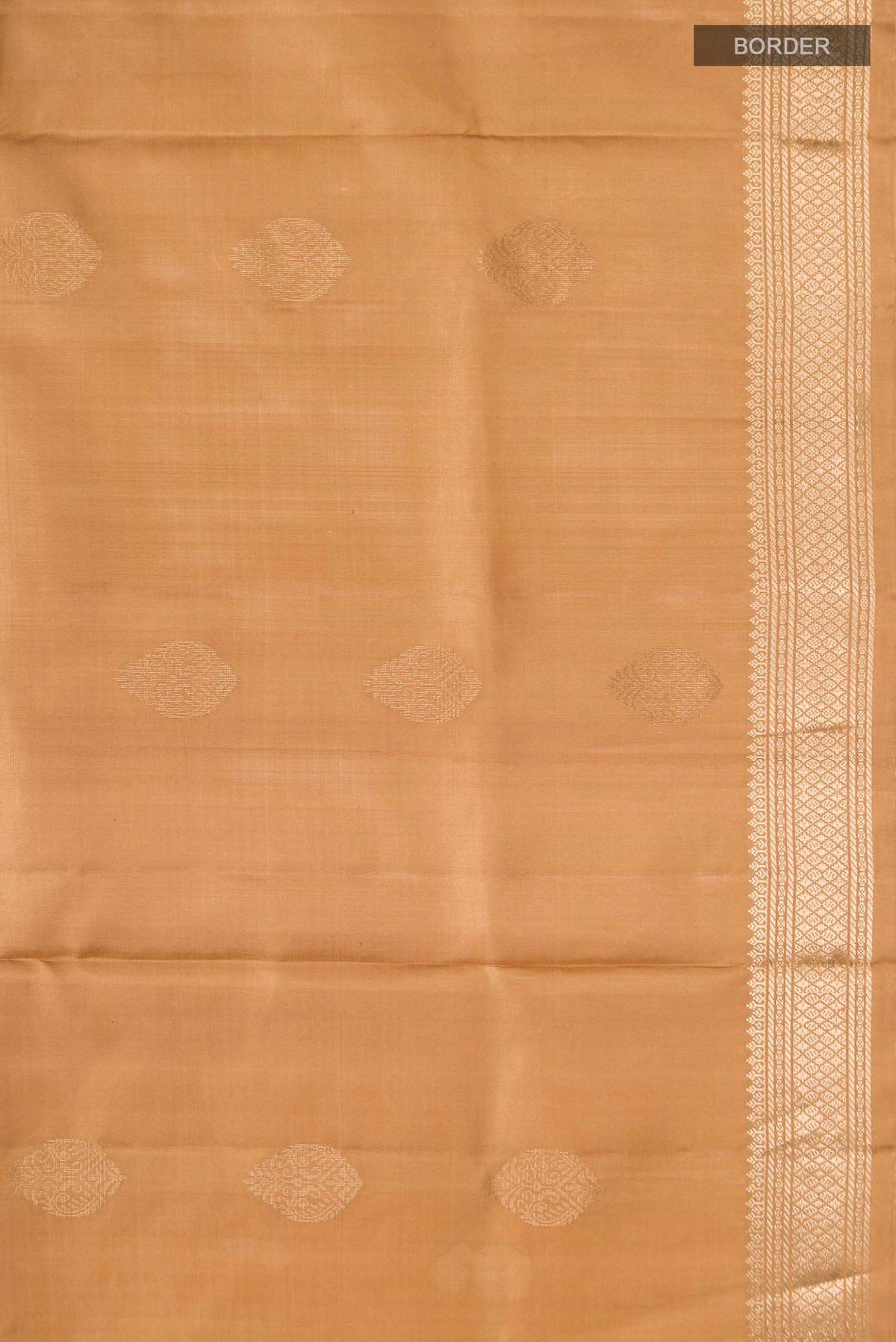 Border image of Brown Soft Silk Saree with Zari Butta on the body and Zari Border