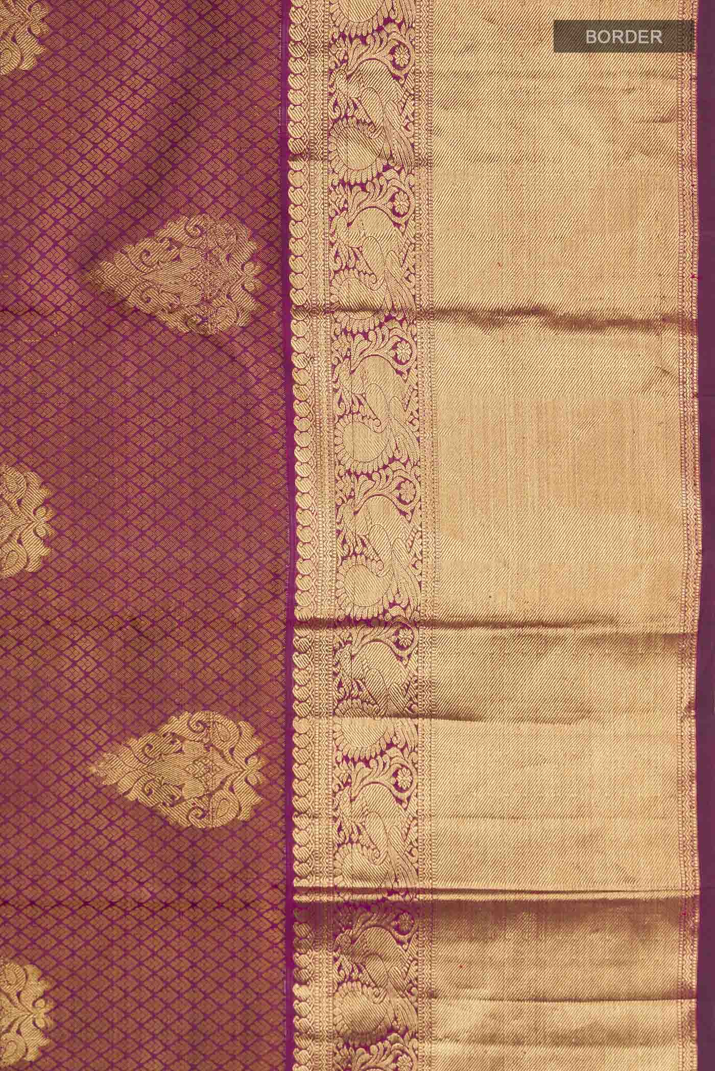 Border image of Maroon Kanchipuram Silk Saree with Jacquard With Zari Butta on the body and Zari Border