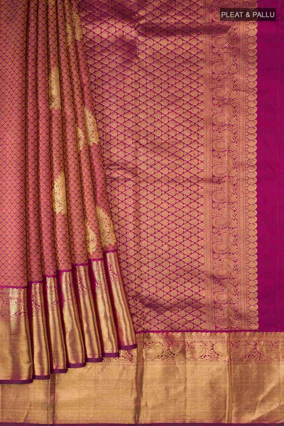 Pleats and pallu of Maroon Kanchipuram Silk Saree with Jacquard With Zari Butta on the body and Zari Border