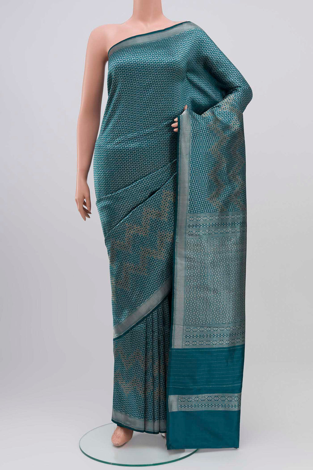 Turquoise Banarasi Katan Silk Saree with Zari Brocade on the body and Zari Border displayed on a mannequin