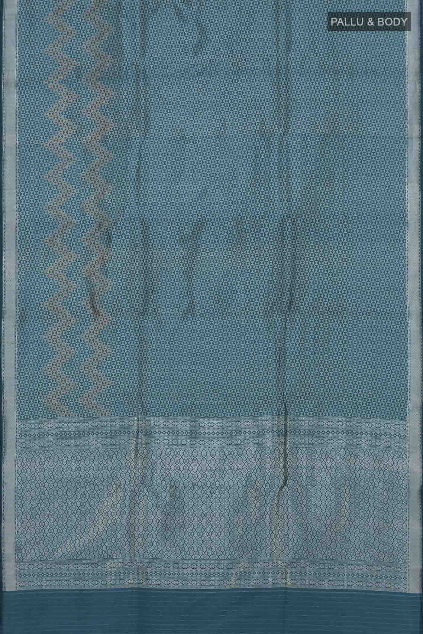 Flat view of Turquoise Banarasi Katan Silk Saree with Zari Brocade on the body and Zari Border