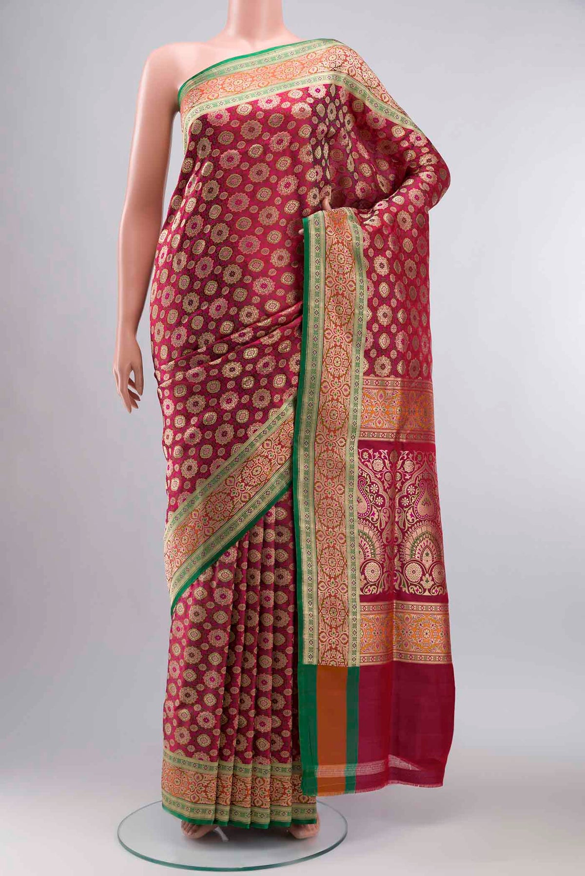 Pink Banarasi Silk Saree with Jacquard With Zari Butta on the body and Zari Border displayed on a mannequin