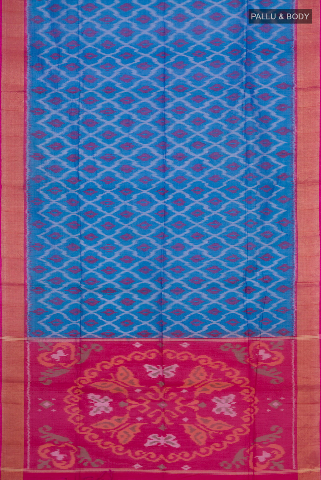 Flat view of Blue Silk Cotton Saree with Ikat design on the body and Zari Border. 
