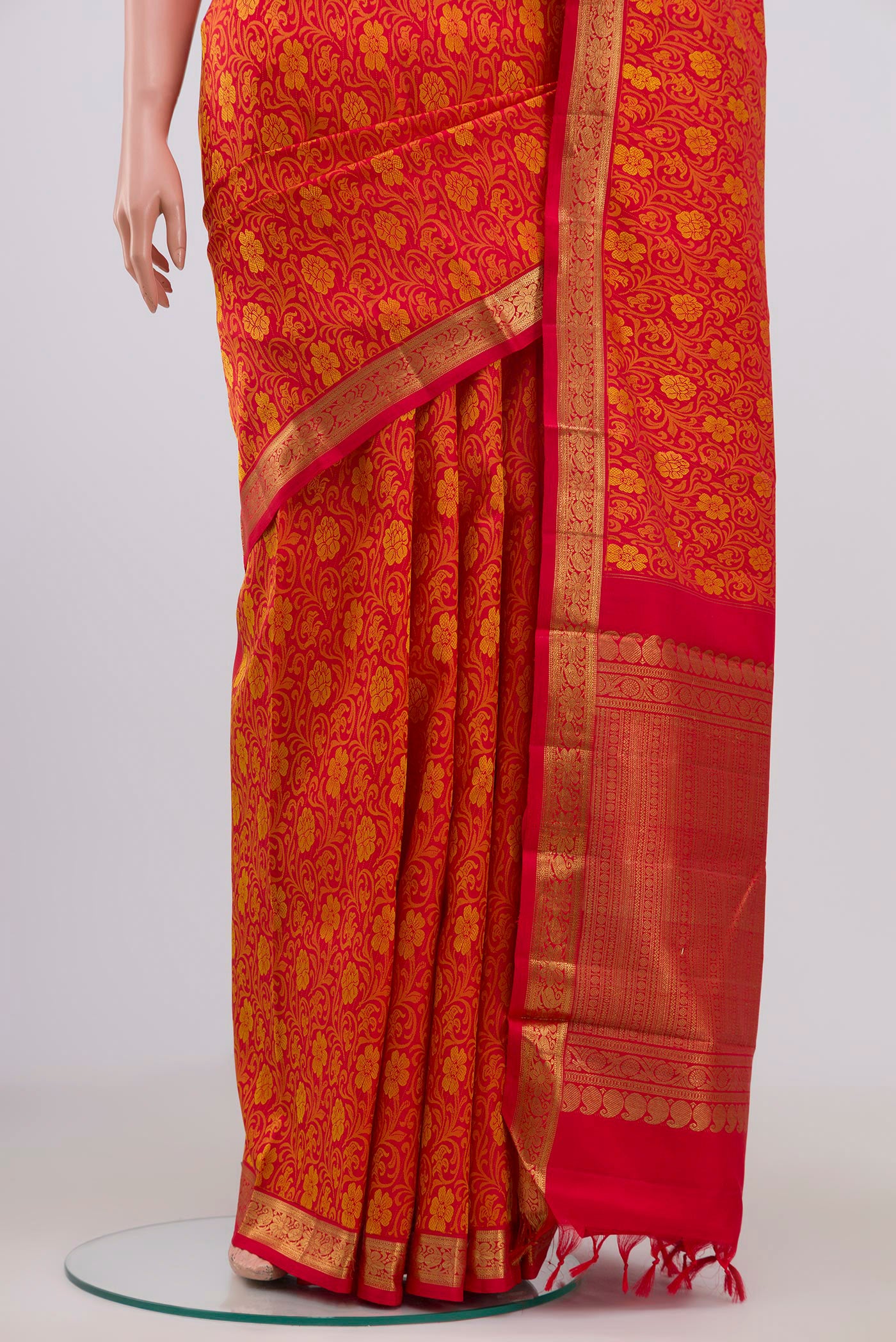 Pleats and pallu of Pure Silk Pure Zari Red Kanjivaram Saree with Jacquard design on the body and Zari Border. 