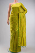 Green Kanchipuram Silk Nine Yards Saree with Stripes on the body and Zari Border displayed on a mannequin