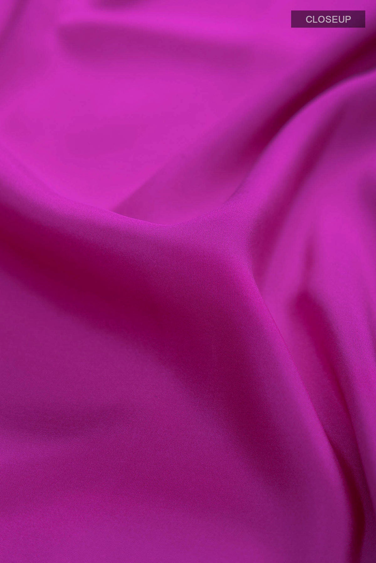 Close up of Pure Silk Pure Zari Purple Mysore Crepe Saree with Plain Body and Zari Border displaying folds