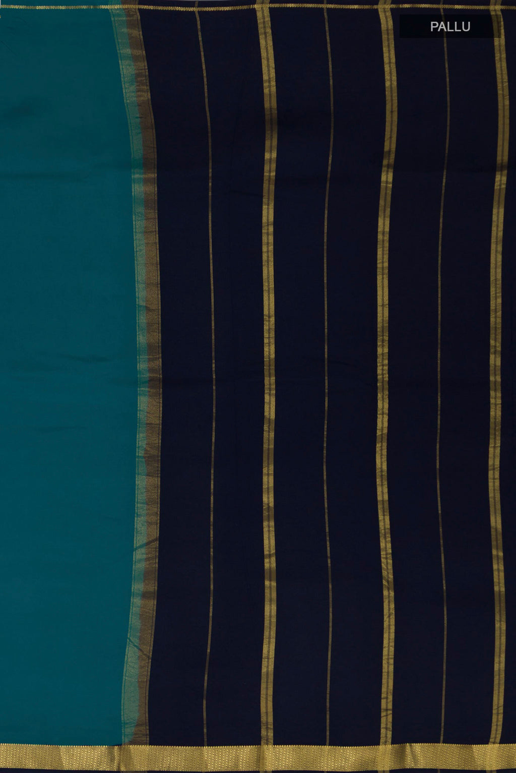Close up image of the pallu of Pure Silk Pure Zari Peacock Blue Mysore Silk Saree with Plain Body and Zari Border. 