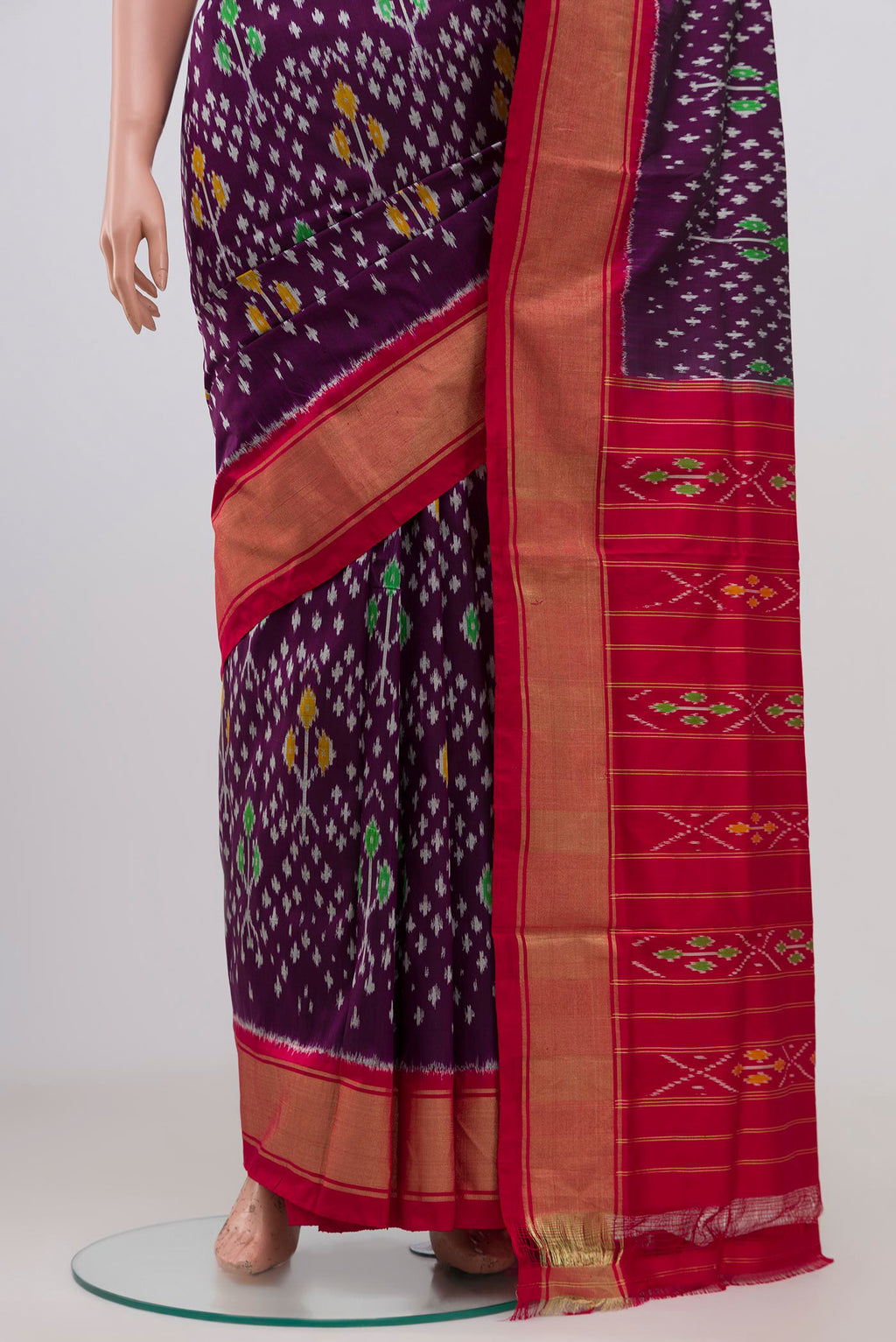 Pleats and pallu of Purple Pochampally Silk Saree with Ikat Print on the body and Zari Border. 