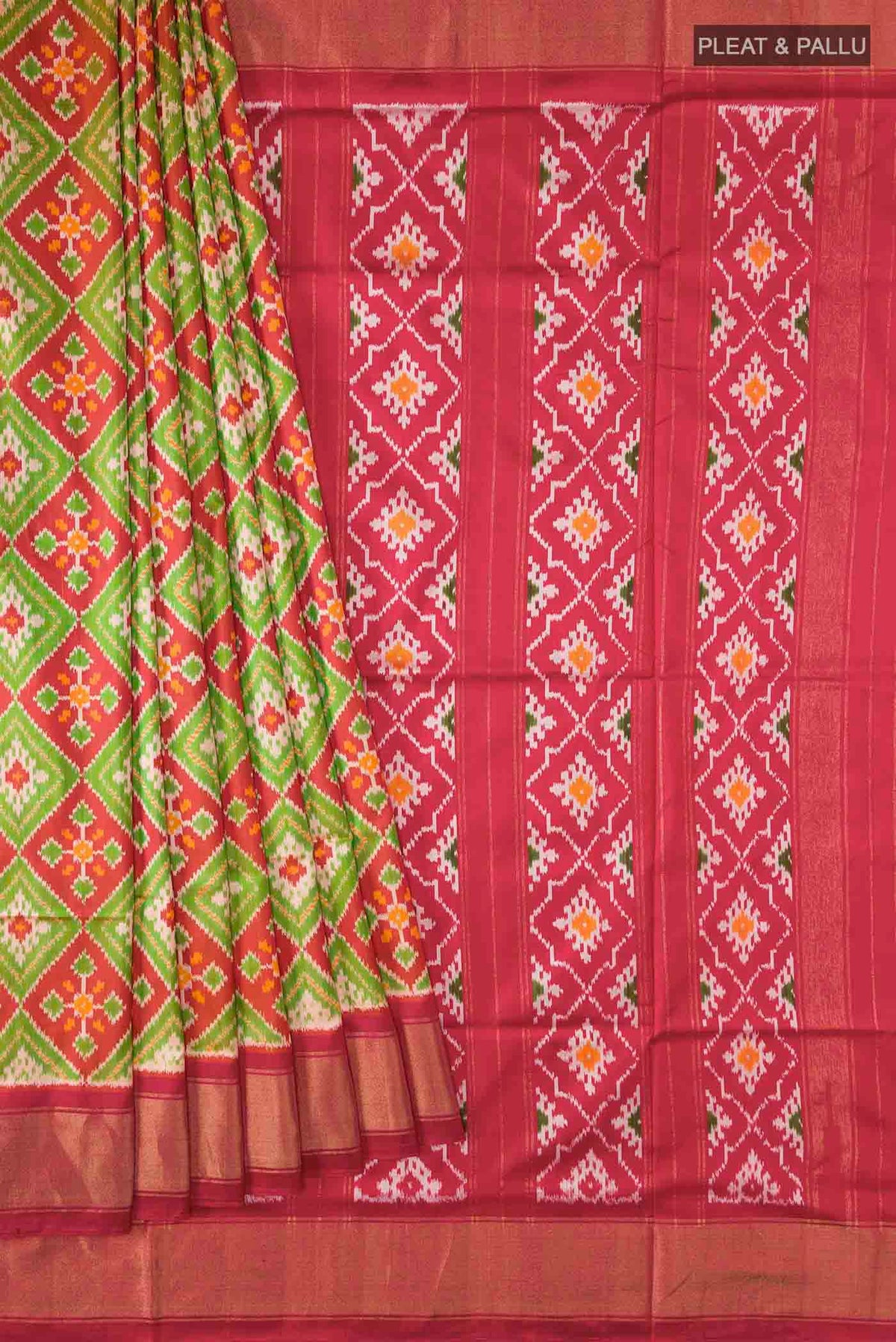Pleats and pallu of Rust Pochampally Silk Saree with Pure Ikat on the body and Zari Border