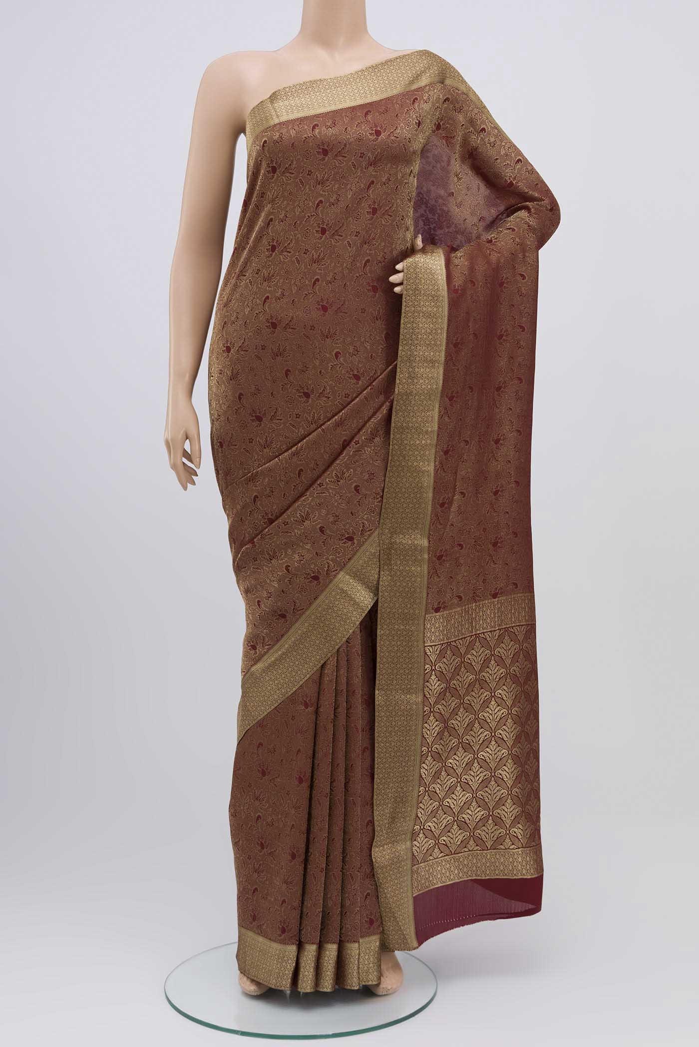Maroon Mysore Crepe Saree with Zari Brocade on the body and Zari Border displayed on a mannequin