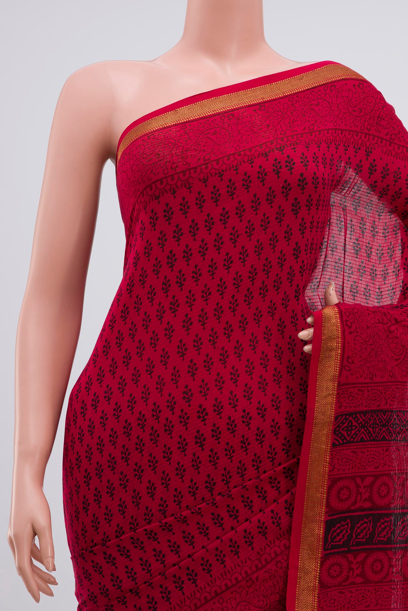 Border image of Red Maheshwari Silk Cotton Saree with Printed design on the body and Zari Border. 