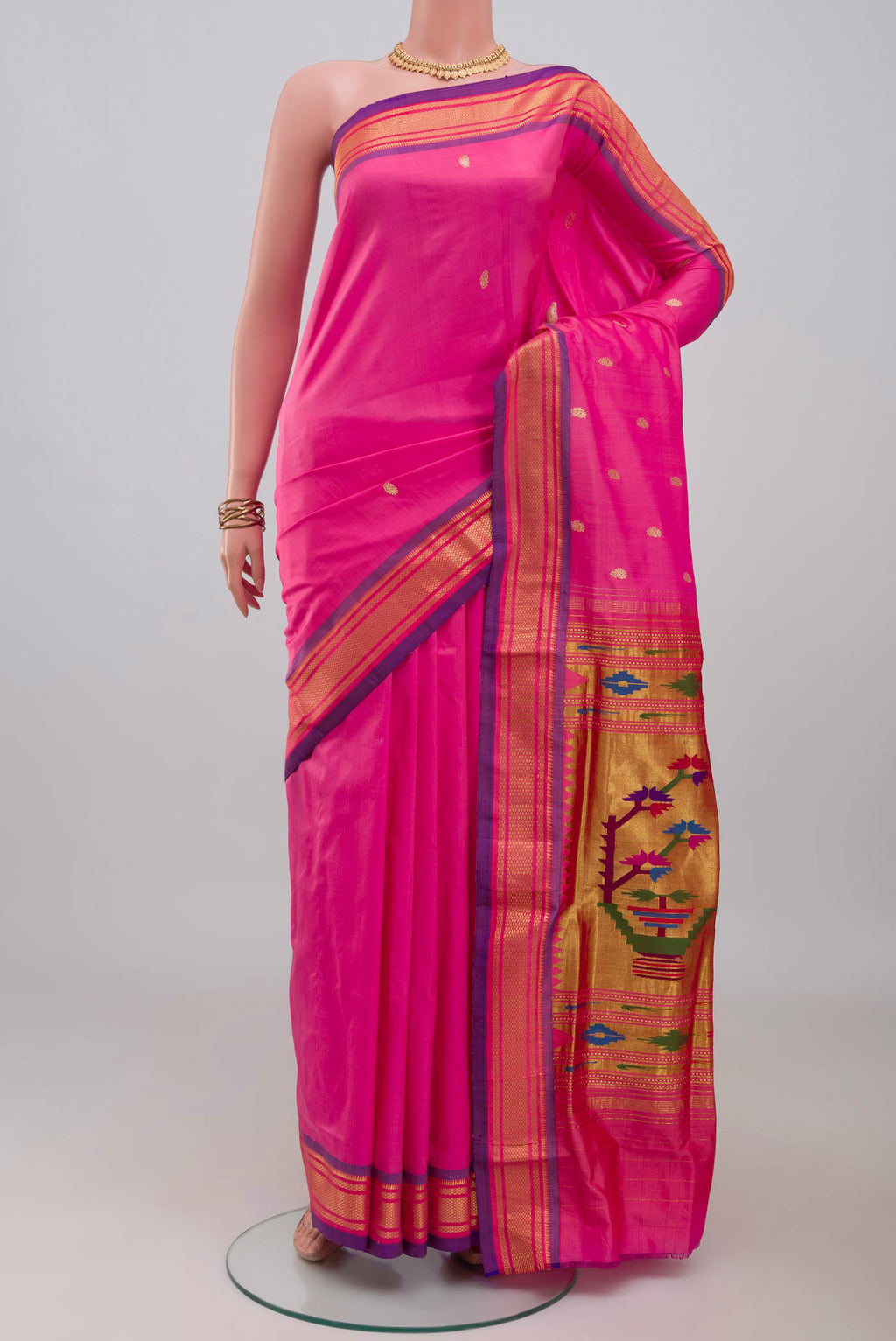 Pink Paithani Silk Saree with Zari Butta on the body and Zari Border.  displayed on a mannequin