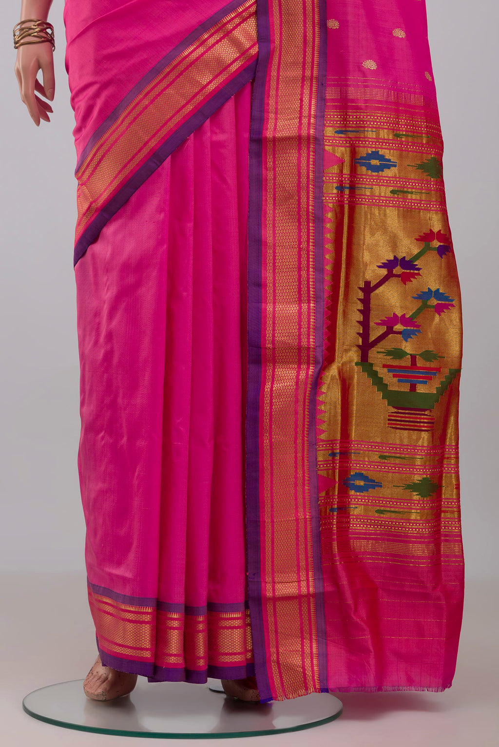 Pleats and pallu of Pink Paithani Silk Saree with Zari Butta on the body and Zari Border. 