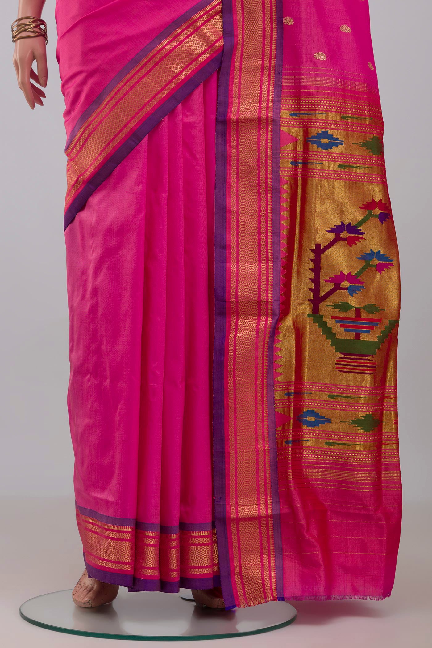 Pleats and pallu of Pink Paithani Silk Saree with Zari Butta on the body and Zari Border. 