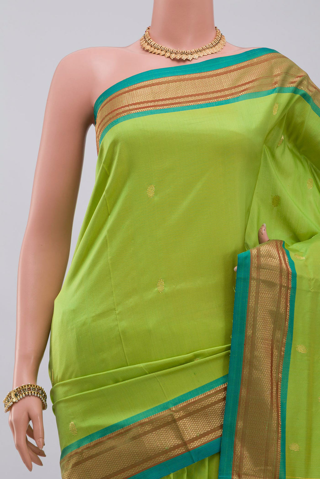 Border image of Green Paithani Silk Saree with Zari Butta on the body and Zari Border. 