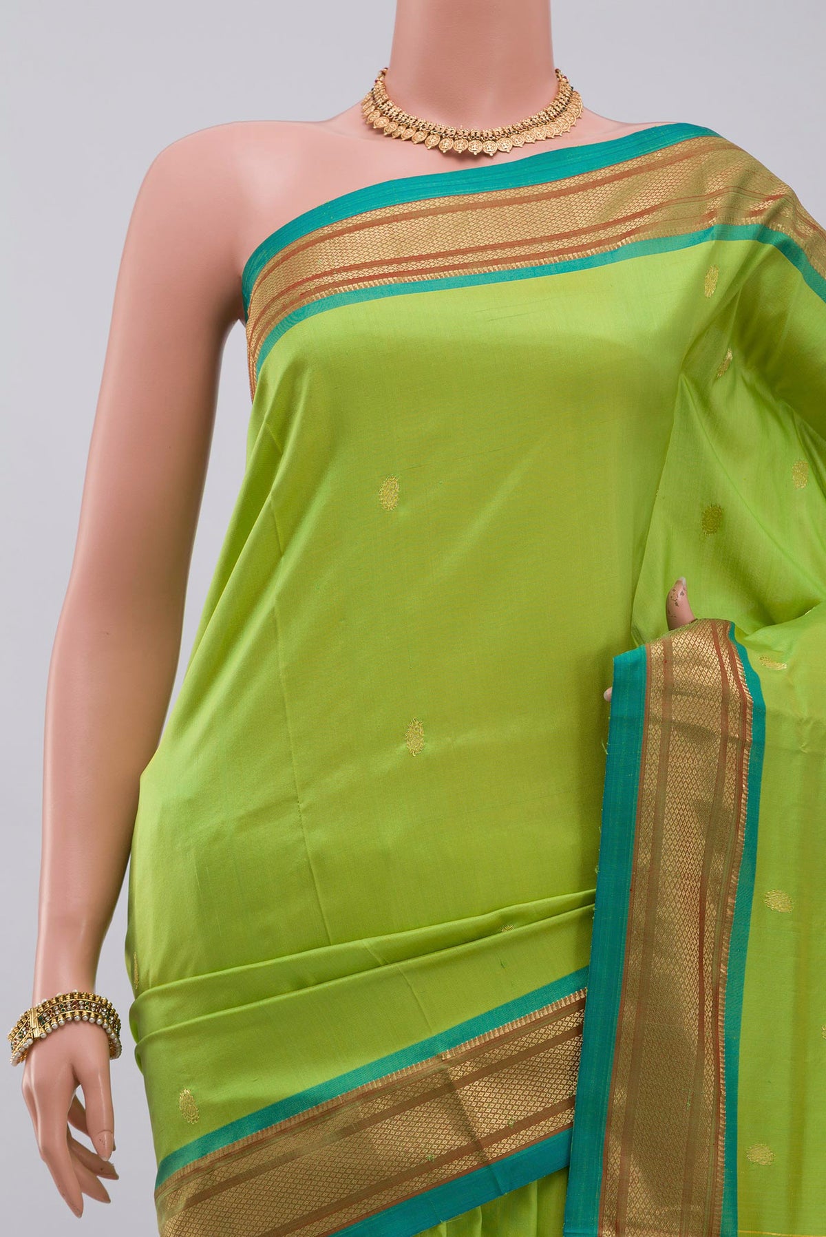 Border image of Green Paithani Silk Saree with Zari Butta on the body and Zari Border. 