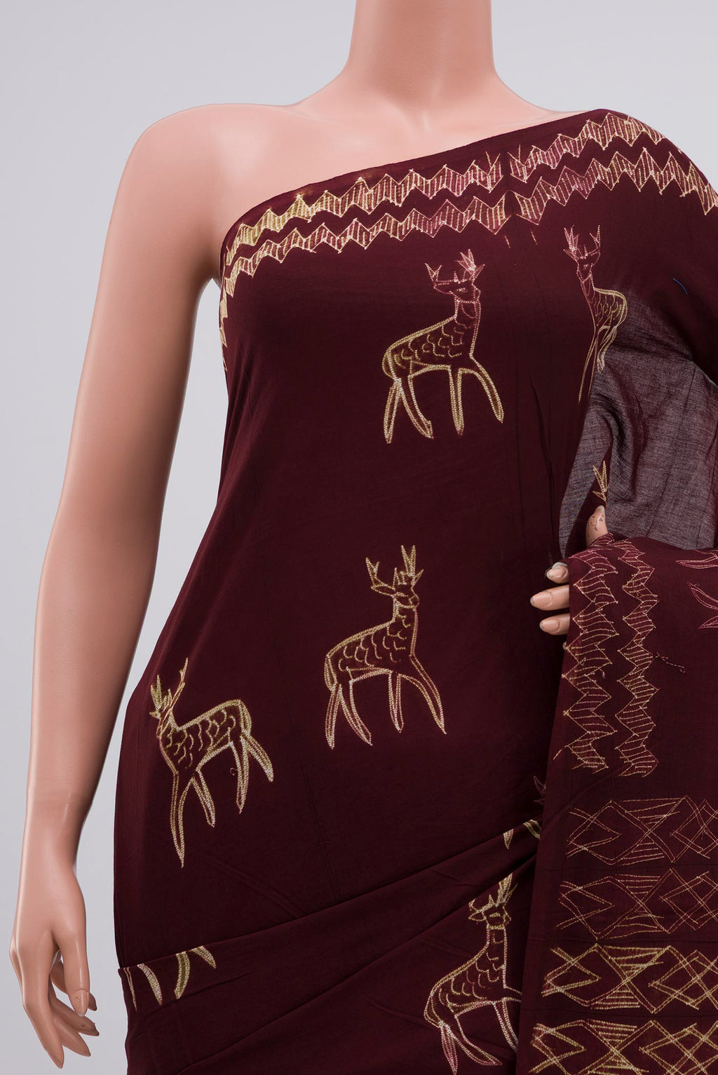 Border image of Brown Printed Cotton Saree with Printed design on the body and Without Border. 