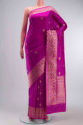 Light Magenta Banarasi Katan Silk Saree with Zari Butta on the body and Zari Border displayed on a mannequin