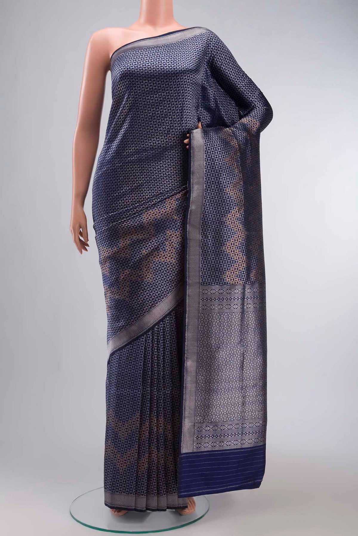 Navy Blue Banarasi Katan Silk Saree with Zari Butta on the body and Zari Border displayed on a mannequin