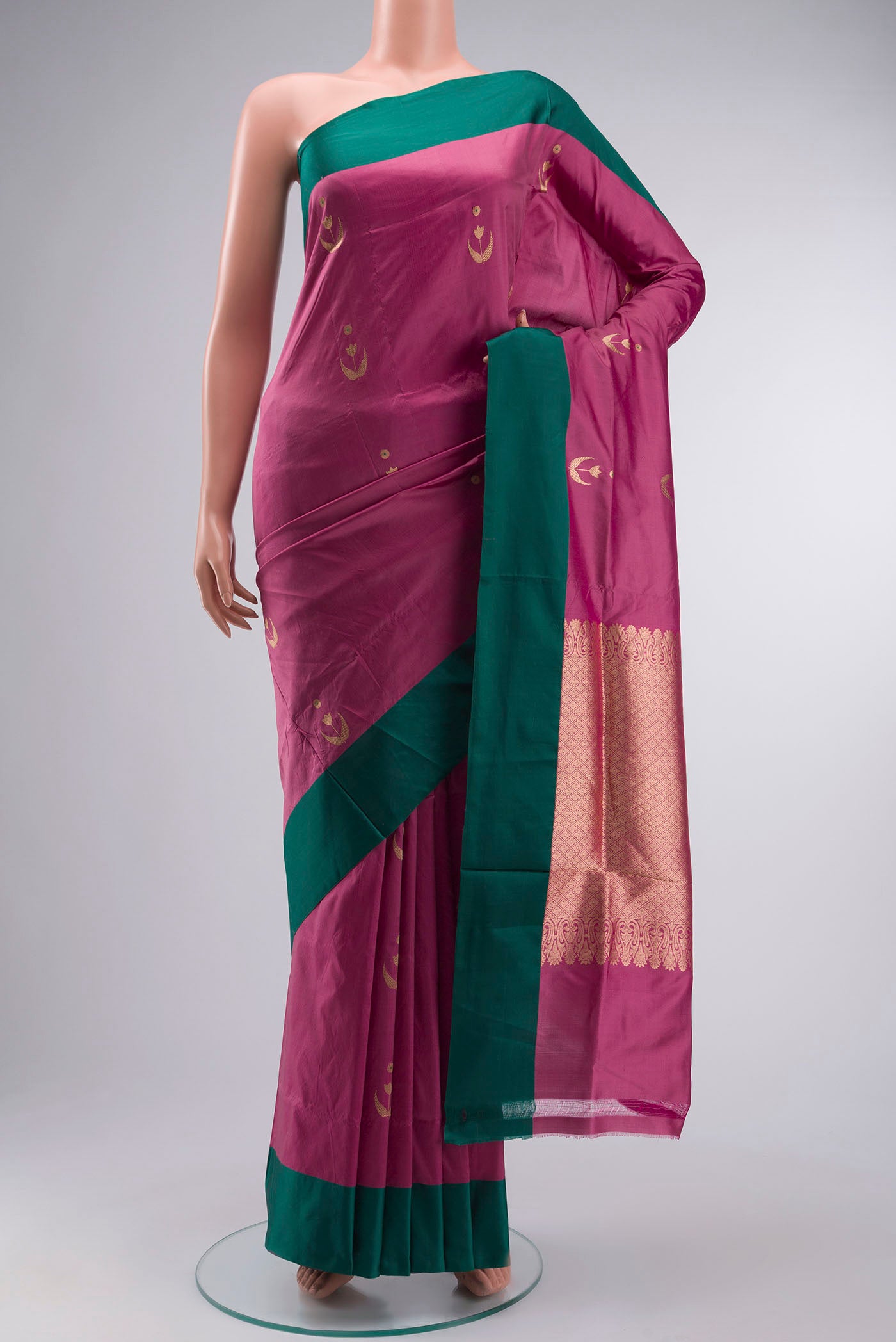 Pink Banarasi Katan Silk Saree with Zari Butta on the body and Plain Border displayed on a mannequin