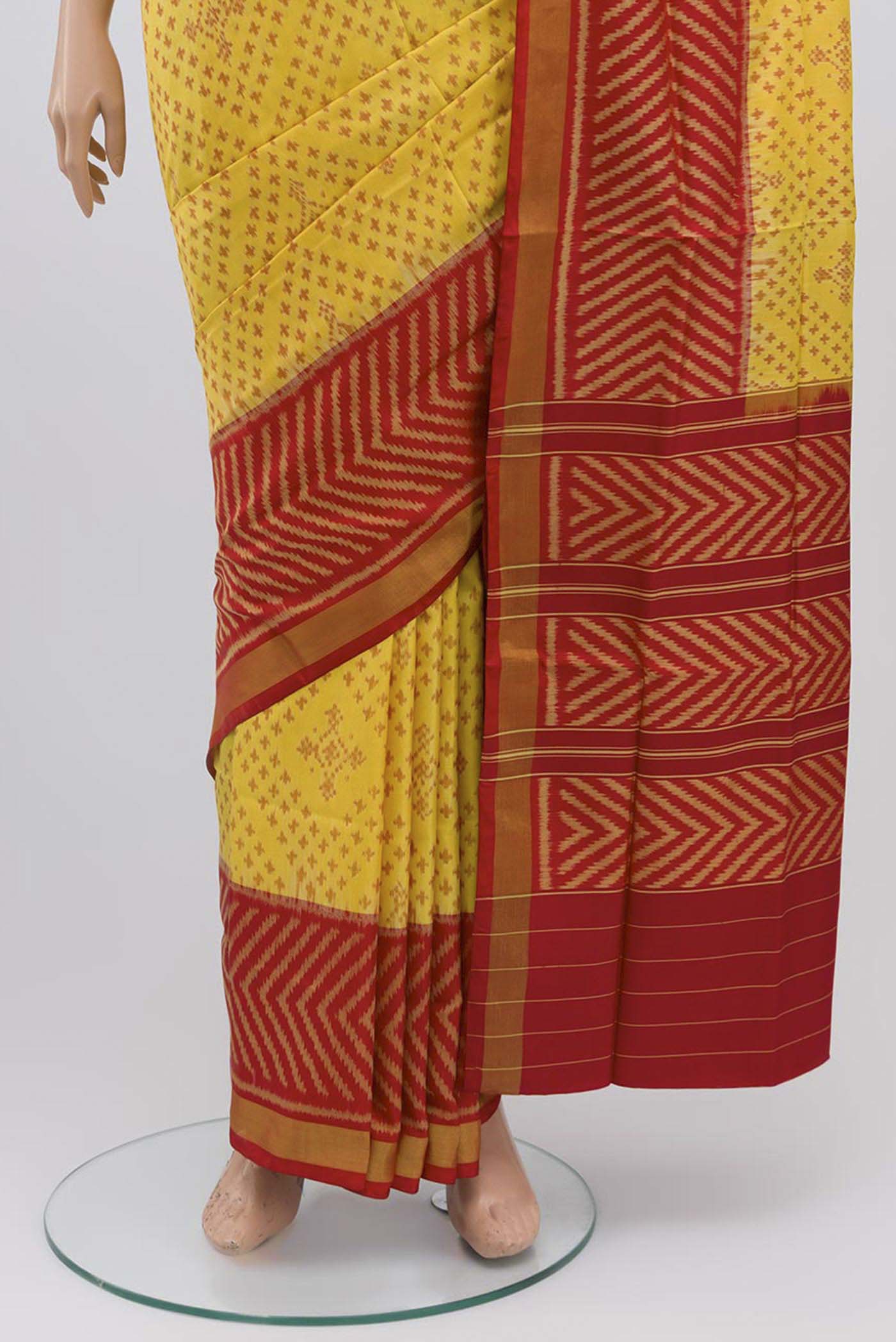 Pleats and pallu of Yellow Rajkot Patola Silk Saree with Ikat design on the body and Zari Border
