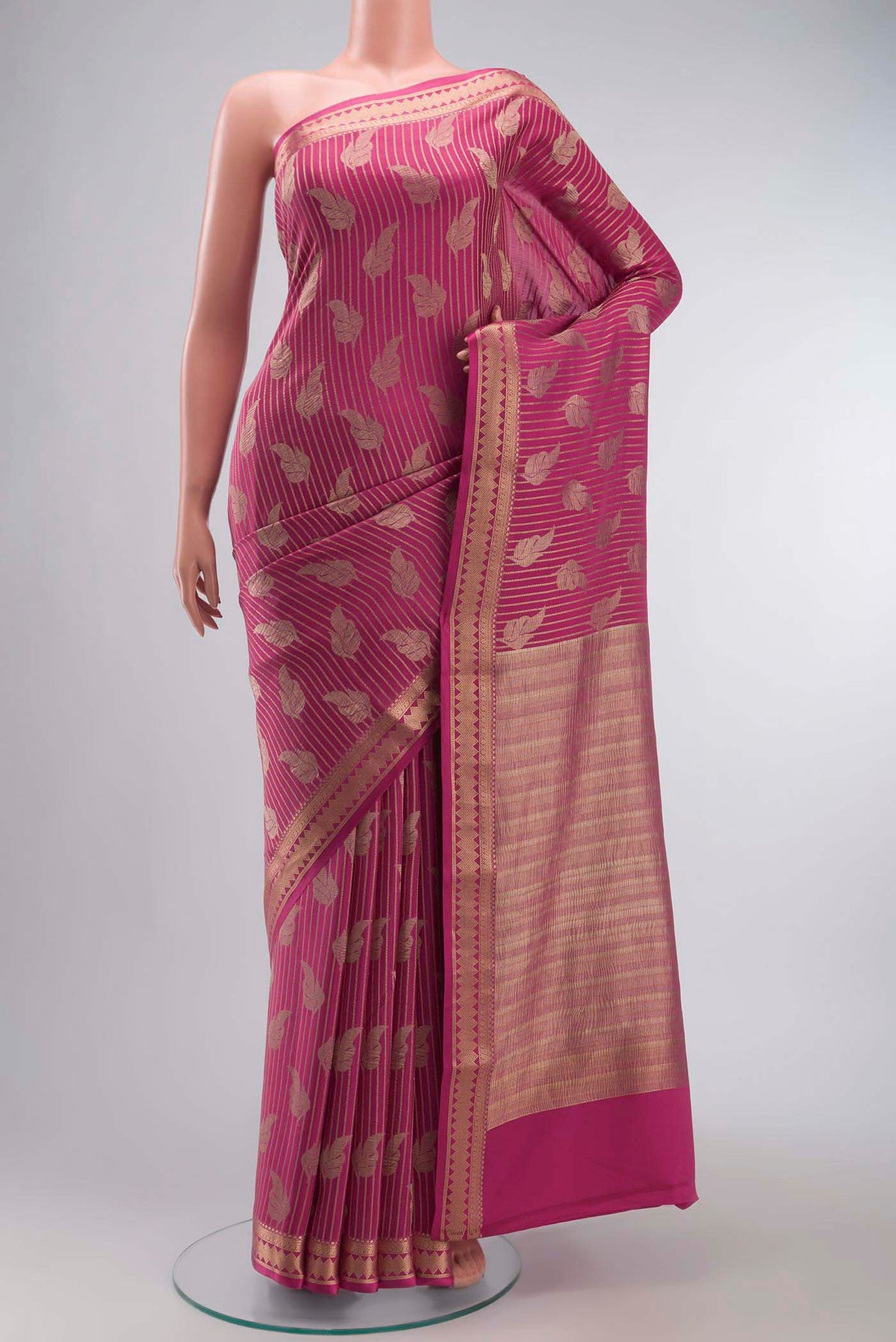 Pink Mysore Crepe Saree with Zari Butta on the body and Zari Border displayed on a mannequin