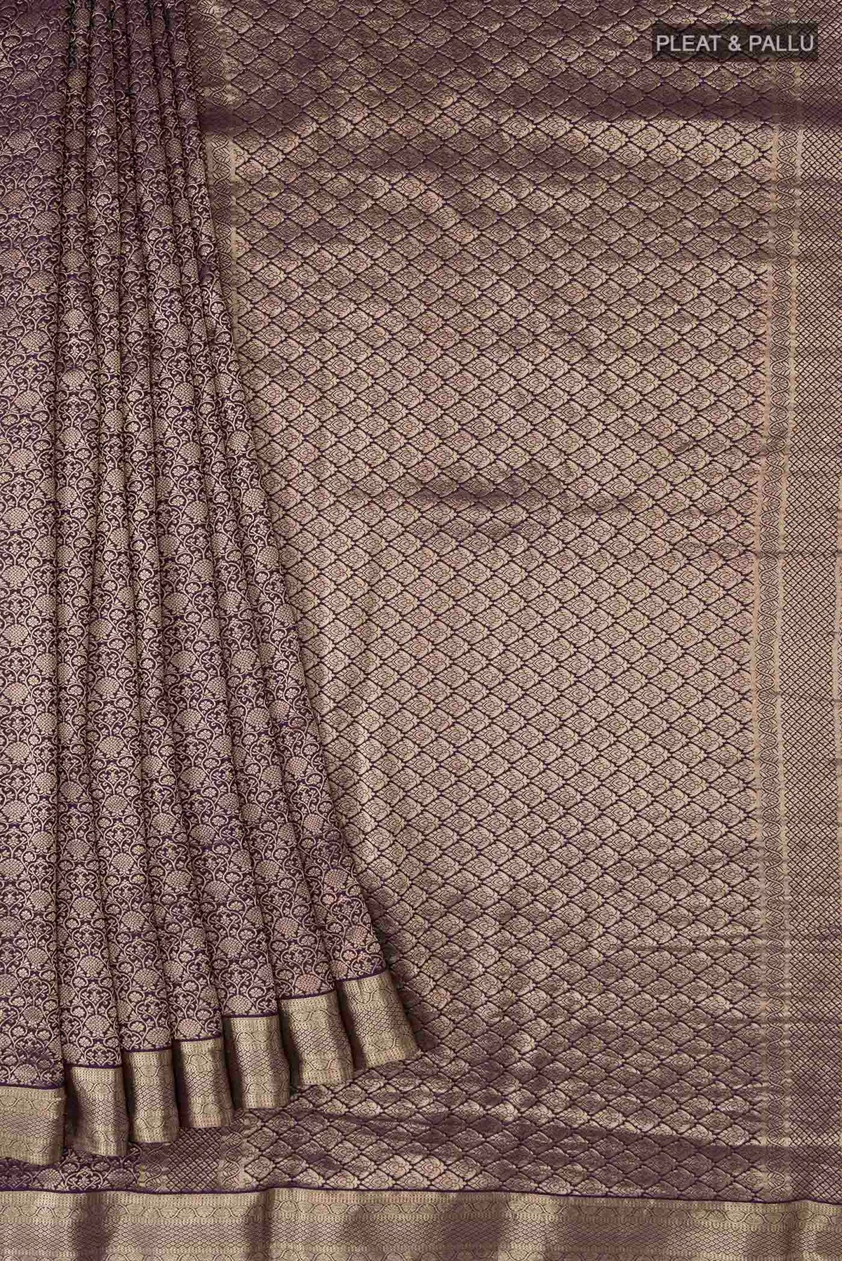 Pleats and pallu of Navy Blue Mysore Crepe Saree with Zari Brocade on the body and Zari Border