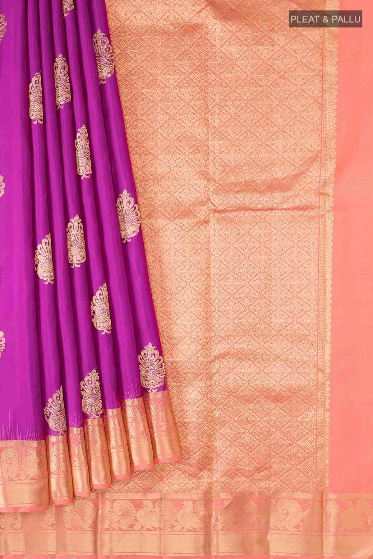 Pleats and pallu of Purple Kanchipuram Silk Saree with Zari Butta on the body and Zari Border