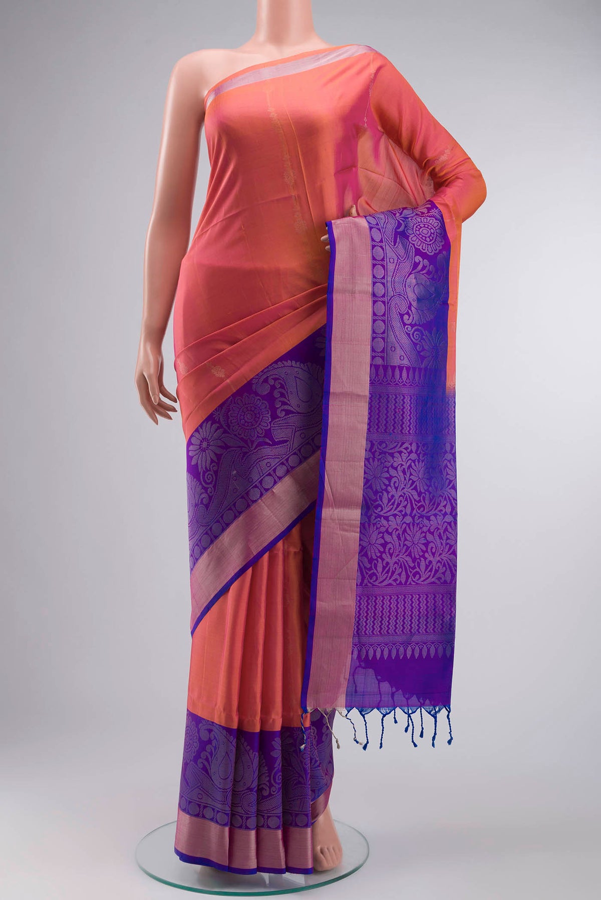 Pink Soft Silk Saree with Zari Butta on the body and Zari Border displayed on a mannequin