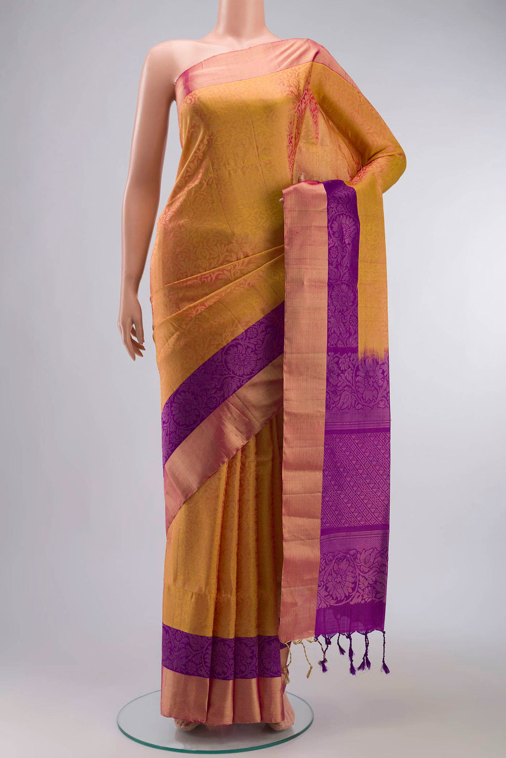 Yellow with Pink Color Soft Silk Saree with Zari Brocade on the body and Zari Border displayed on a mannequin
