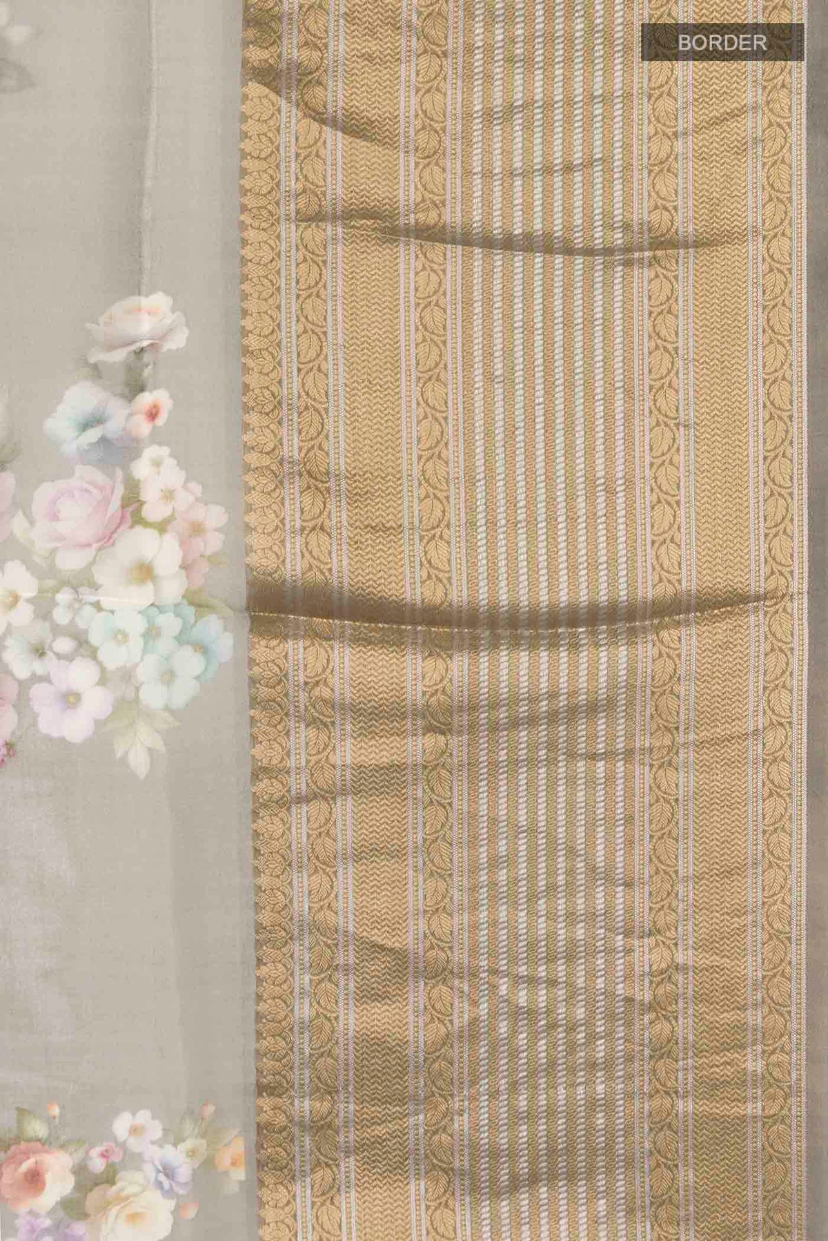 Border image of Grey Organza Silk Saree with Printed design on the body and Zari Border