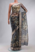 Grey Organza Silk Saree with Printed design on the body and Zari Border displayed on a mannequin